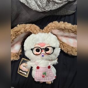 Adorable White and Brown Stuffed Animal with Glasses